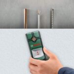 Bosch Truvo Ortungsgerät mit LED-Anzeige beim Absuchen einer Wand