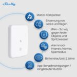 Shelly Flood Gen4 Wassersensor mit angeschlossenem Leck-Sensorkabel auf dem Boden