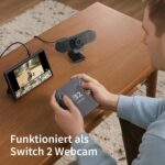 Webcam an einer Spielkonsole mit Bild auf dem Handheld-Display
