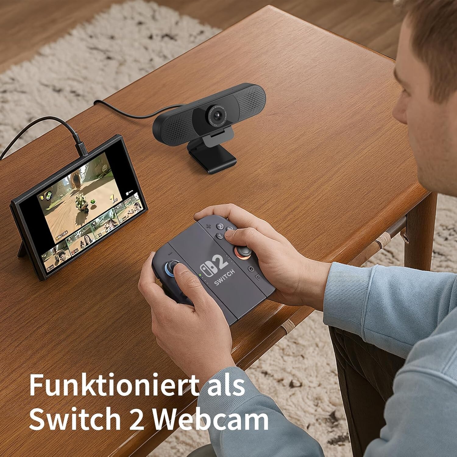 Webcam an einer Spielkonsole mit Bild auf dem Handheld-Display
