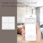 Hand haelt ein Smartphone mit der Tuya-Smart-App, im Hintergrund der an der Wand klebende Szenenschalter