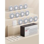 Zwölf weisse X-Sense Rauchmelder XS0B-MR121 mit der Basisstation SBS50 aus dem vernetzten Set.