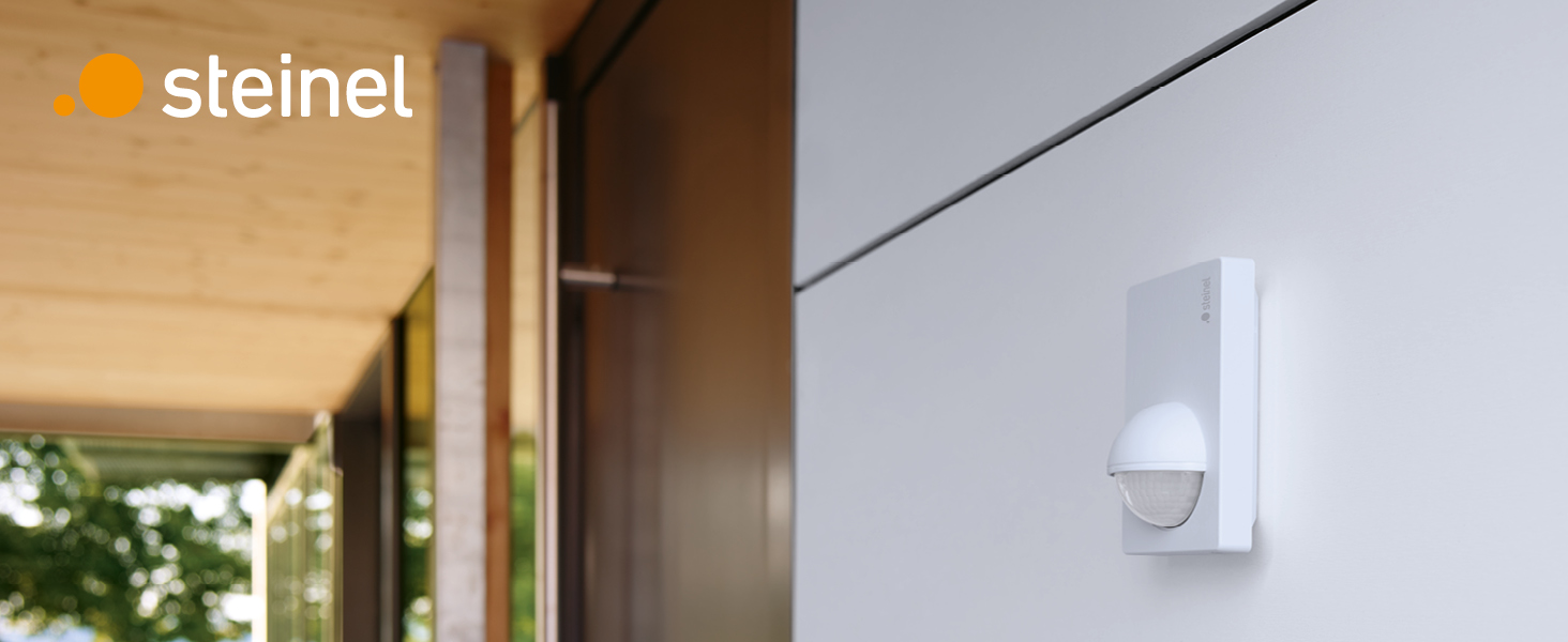 Weisser flacher Bewegungsmelder Steinel IS 180-2 mit halbkugelförmiger Multilinse für die Wandmontage – Detail 1