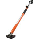Orange Teleskop-Sicherungsstange von SCHMIDT security tools mit schwenkbaren gummierten Andruckplatten
