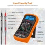 Gelb-schwarzes ULTRICS Digitalmultimeter mit Messleitungen, Batterie und beleuchtetem Display.